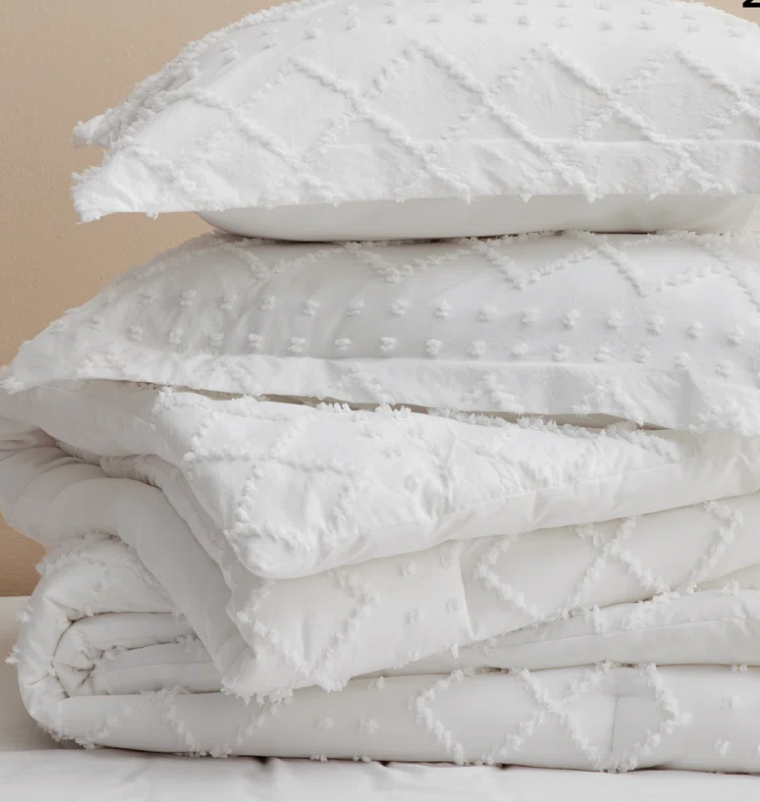 White comforter and two shams